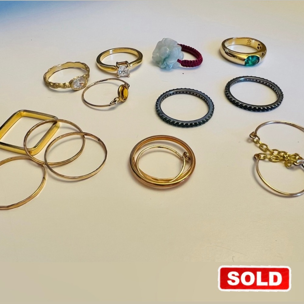Collection of 16 stacking rings. Assorted styles